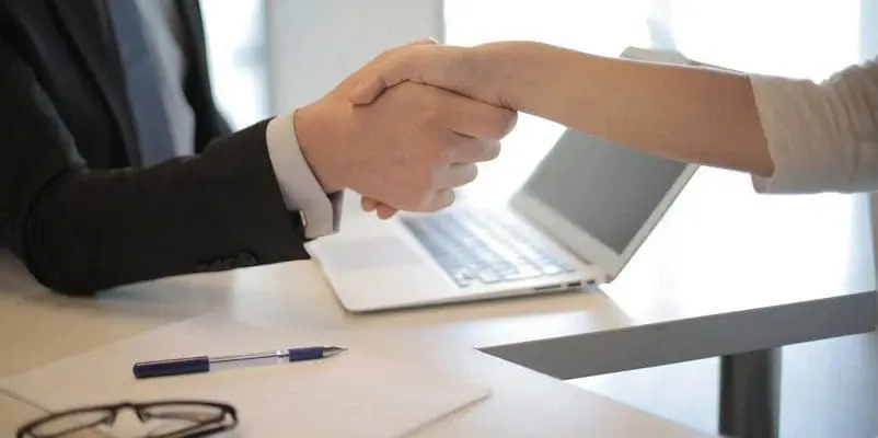 two person shaking hands