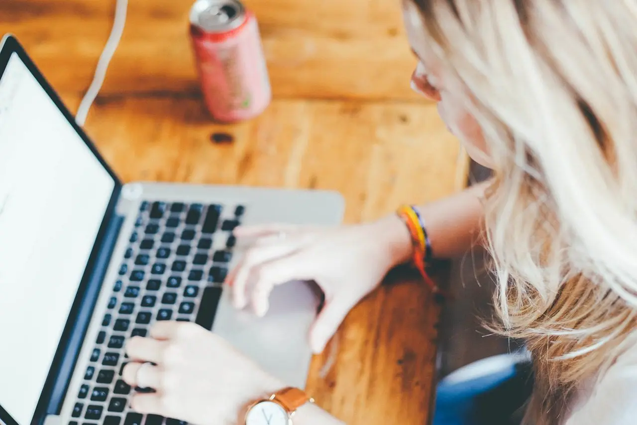 a woman working in a laptop