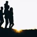 a silhouette of a family