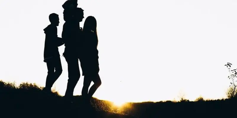 a silhouette of a family