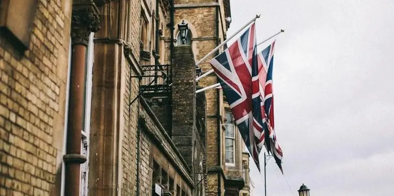 a building with a UK flag hanging on the wall