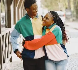 a couple hugging each other