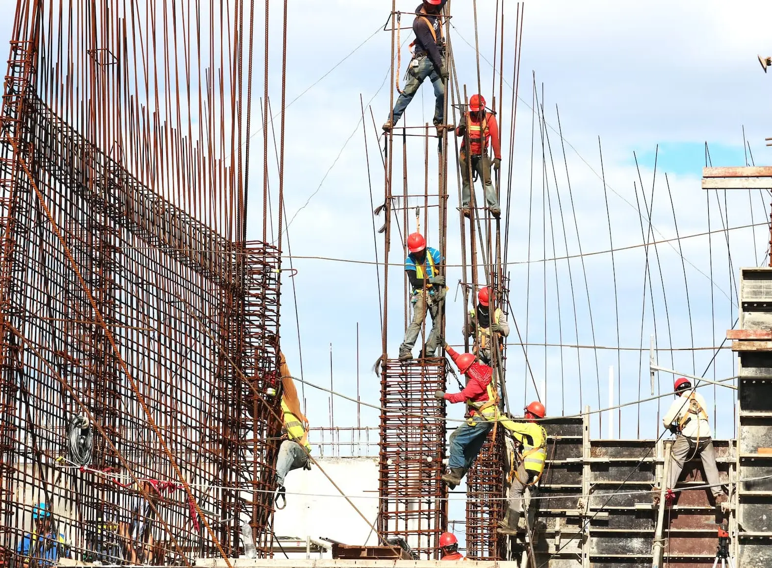 a group of construction workers working in a construction site