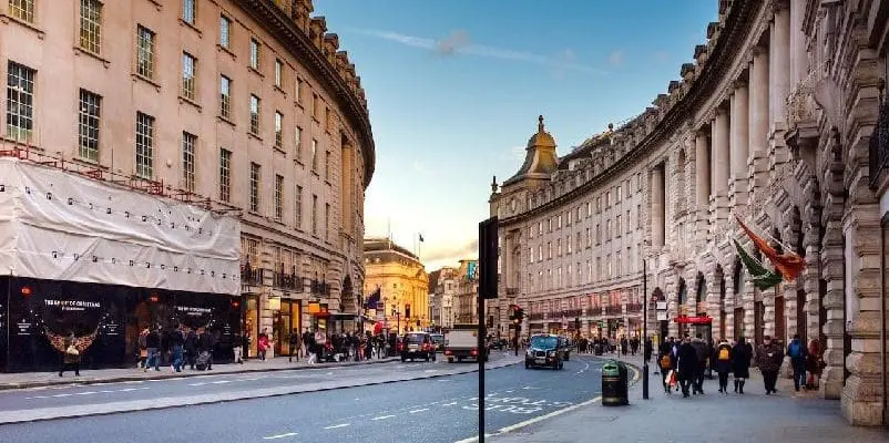 People walking on street in London.