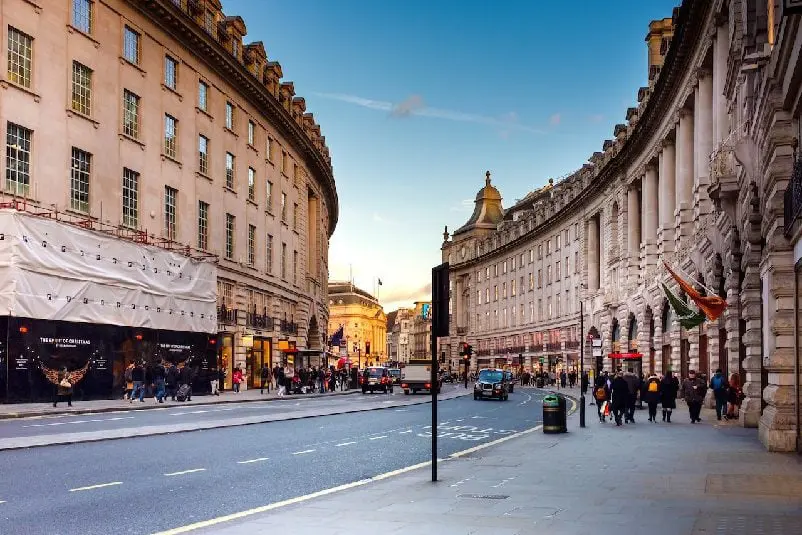People walking on street in London.