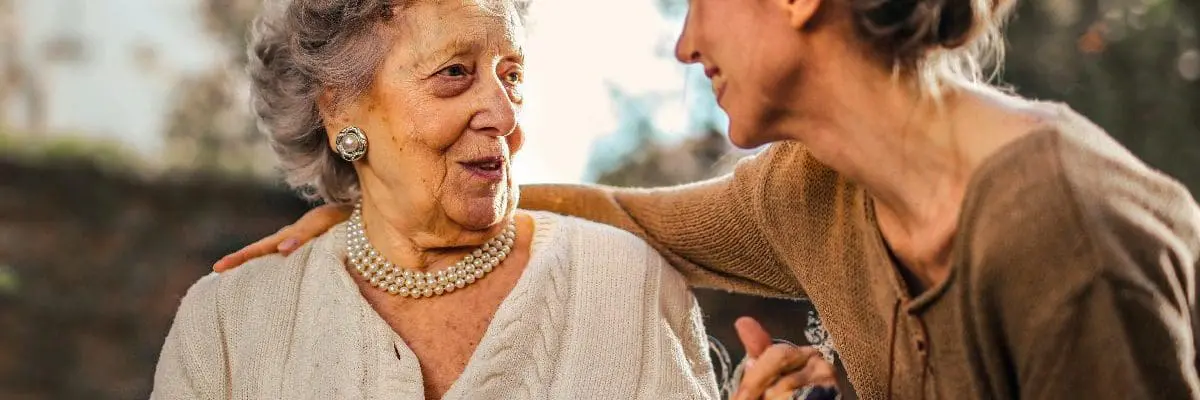 Young adult with elderly woman