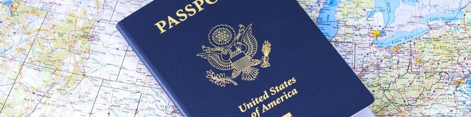 a US passport placed on a map