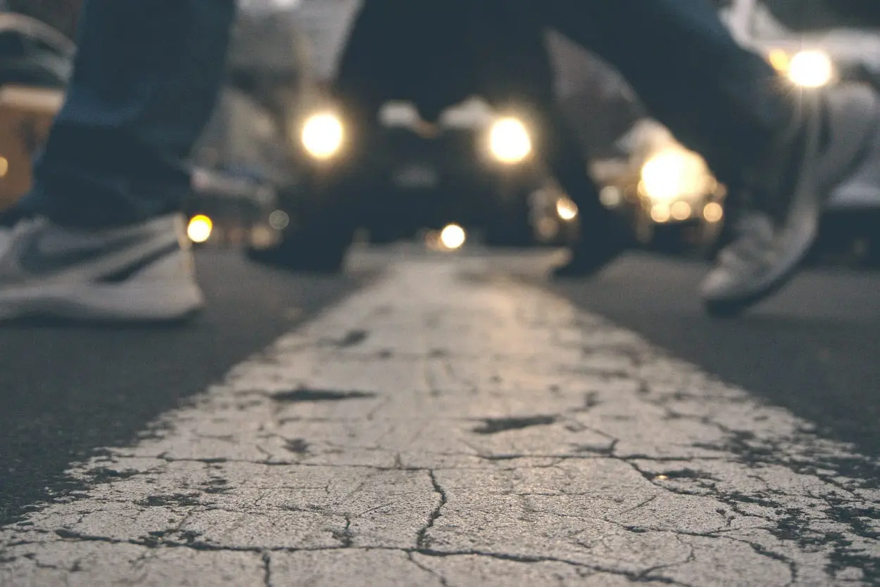 people walking on a road