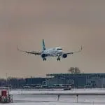 plane touching down at airport