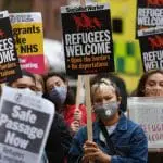 protesters around refugees