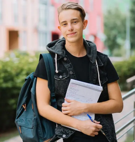 a student with a bag holding a notebook and a pen