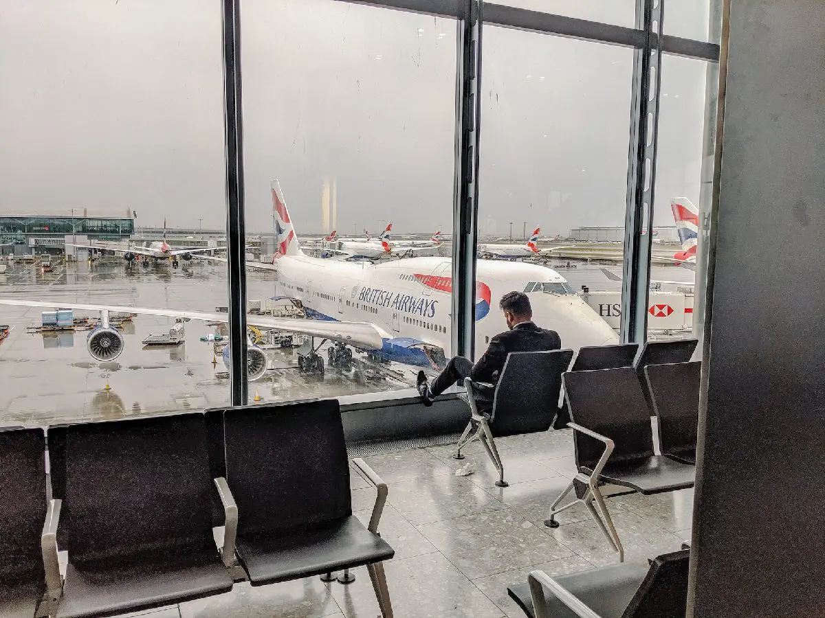 Man waiting at Heathrow Airport