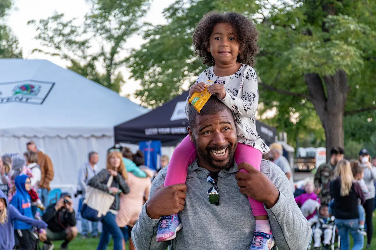 a black father and daughter