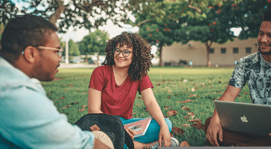 3 students sitting in a circle