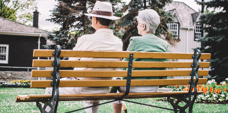 Grandparents sitting on a bench
