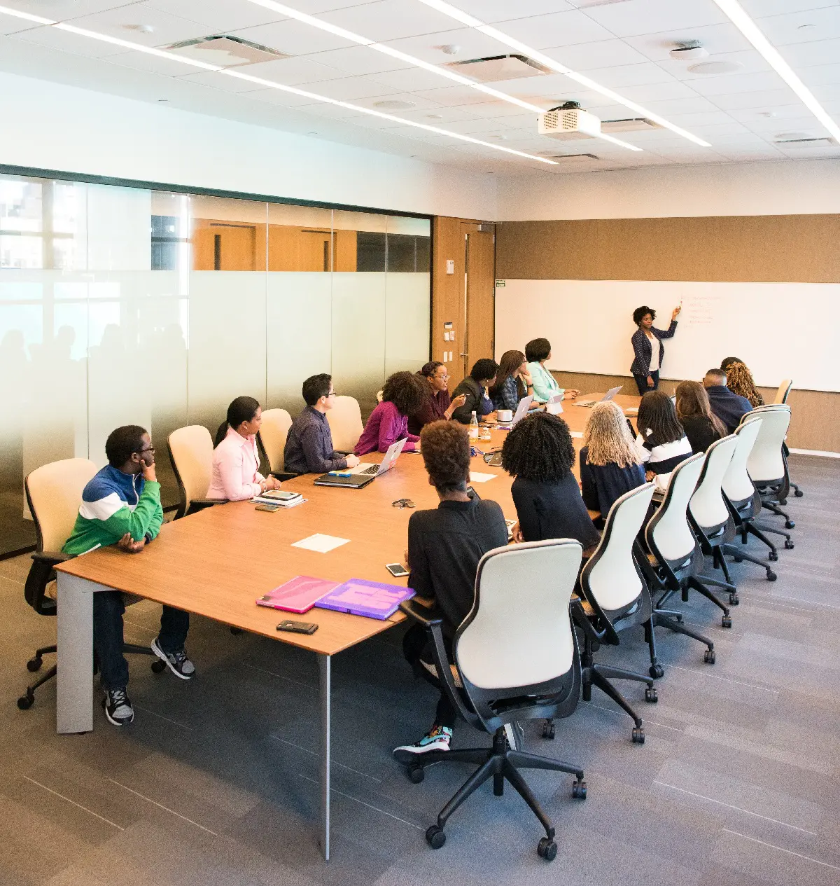 Colleagues in staff meeting