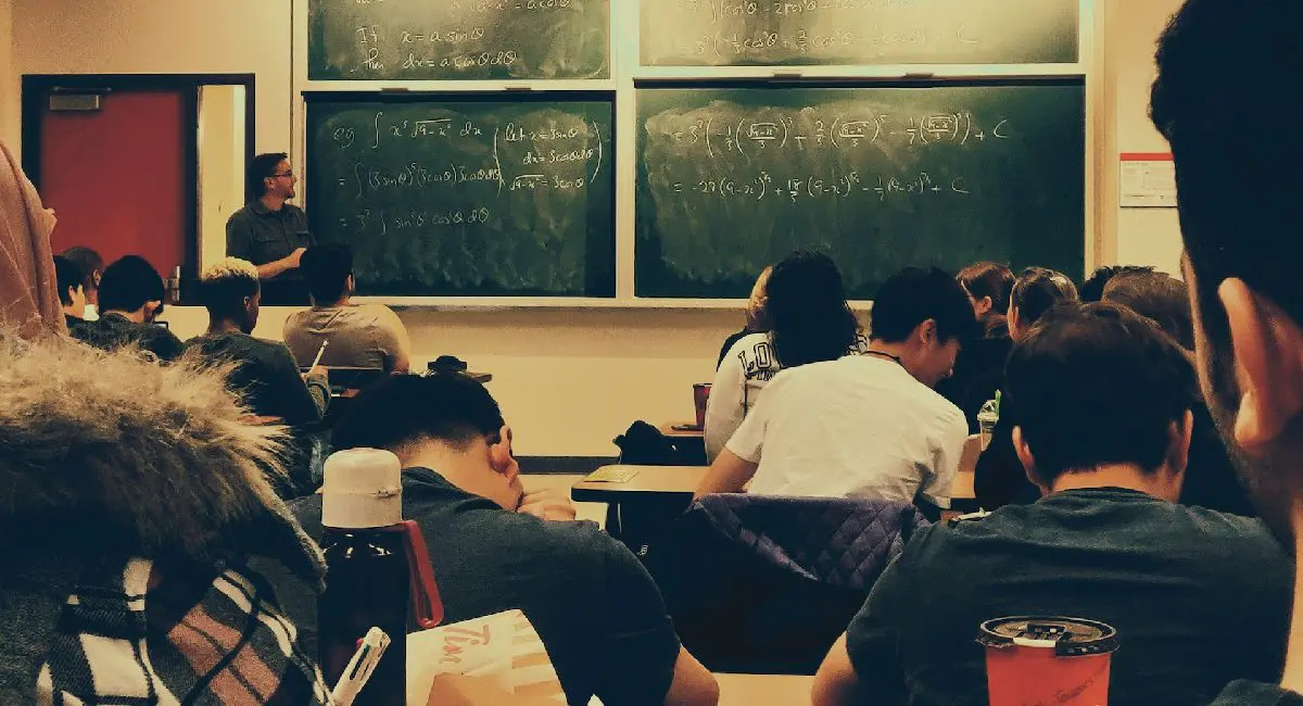 Professor teaching students in lecture class