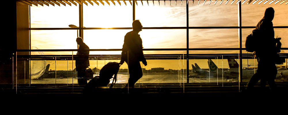 Adult walking through airport