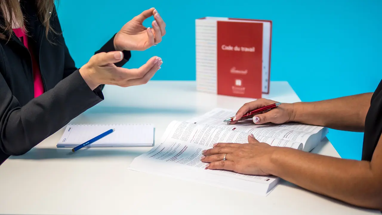 a business lawyer talking to a client