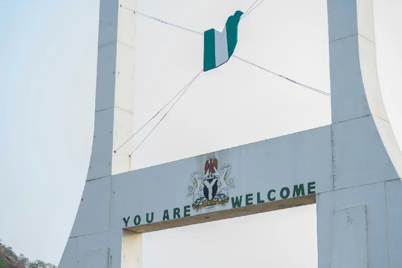 Nigeria welcome sign on white arch