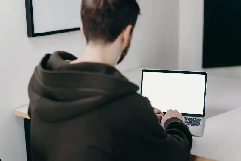 Student using his laptop
