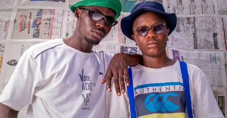 Two Nigerian men standing next to each other