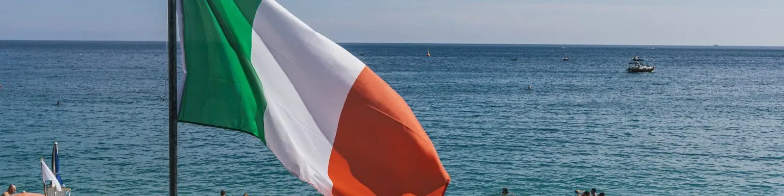 An Ireland flag by the beach