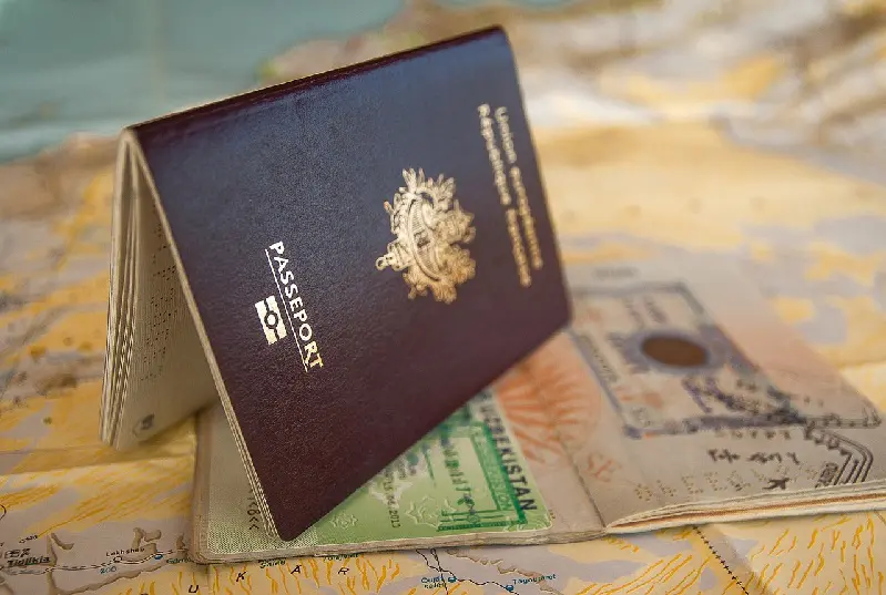 Passports and a visa page open