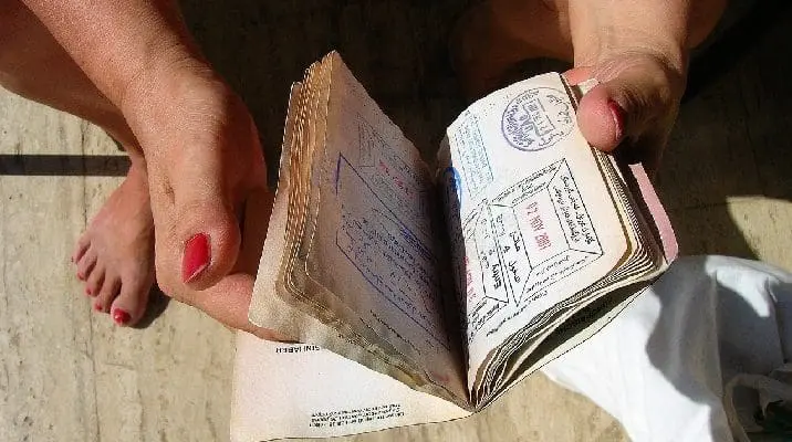 Opened passport with visa stamps