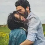 a couple hugging each other