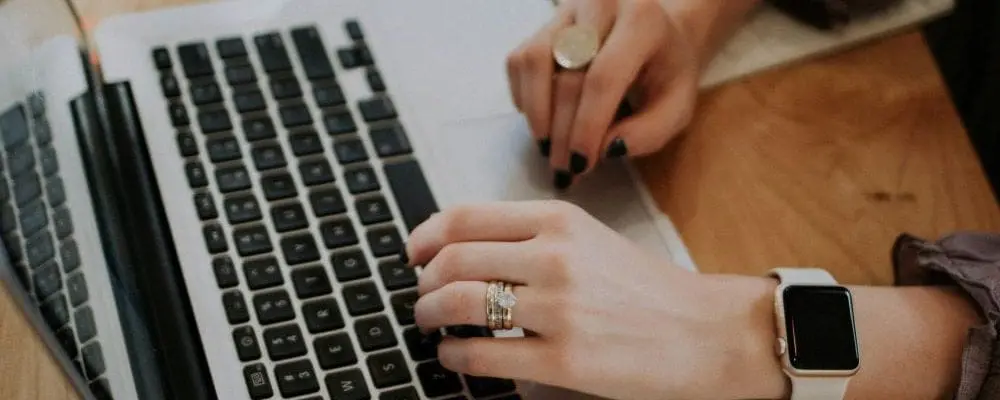 Person typing on laptop