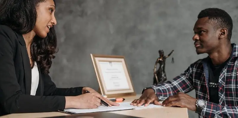 Lawyer having discussion with client