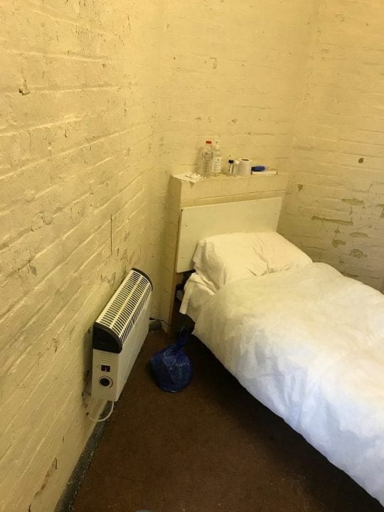 bed in an old room