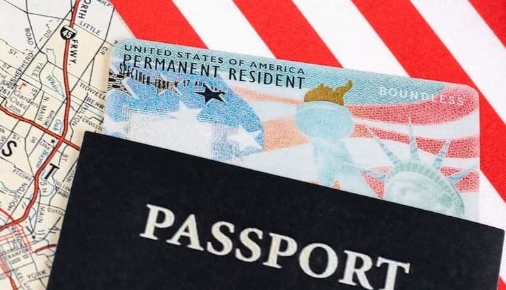 a green card with passport