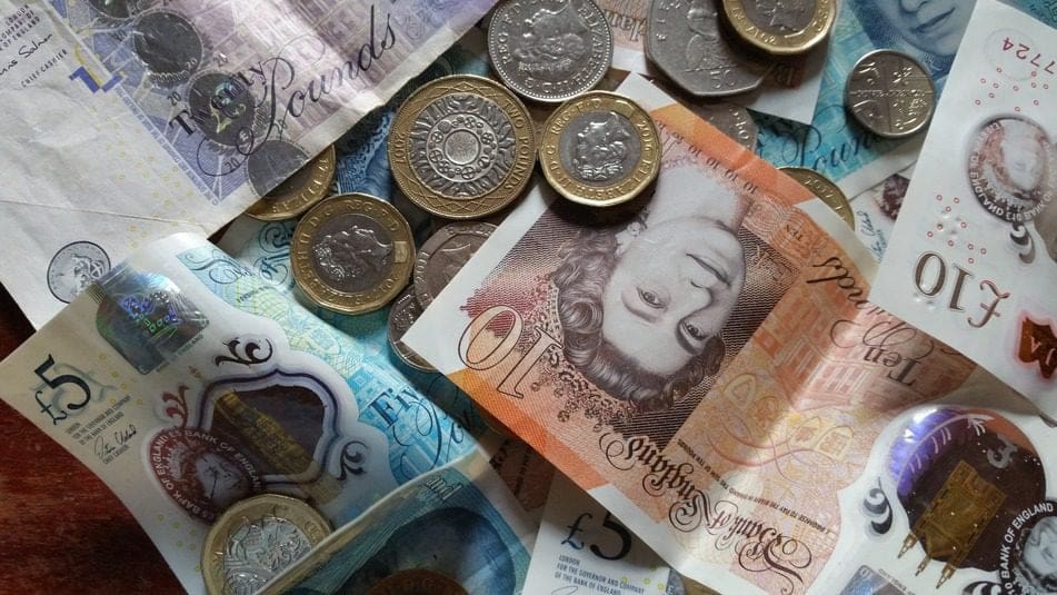 pound bank notes and coins