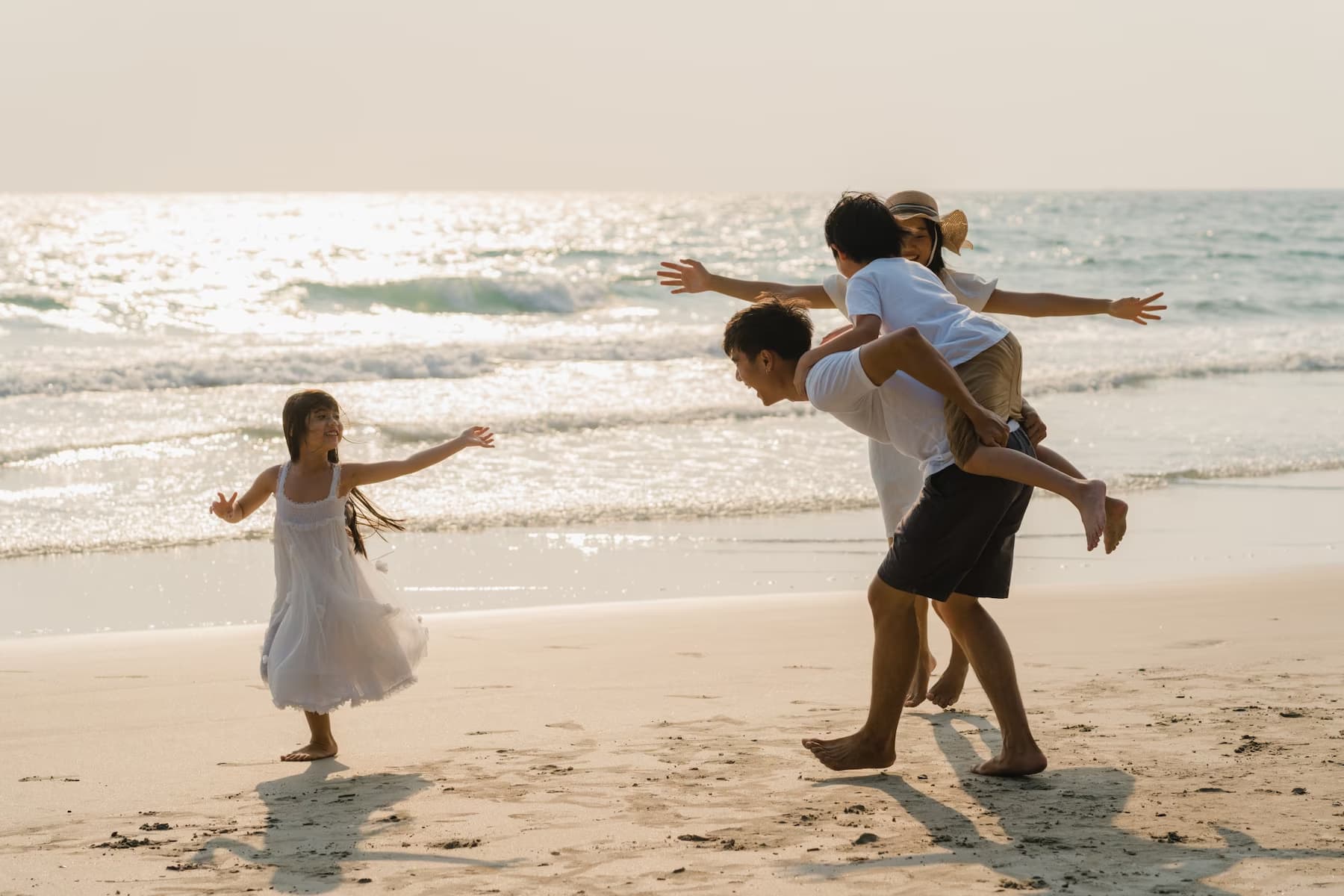 a family enjoying at the beach
