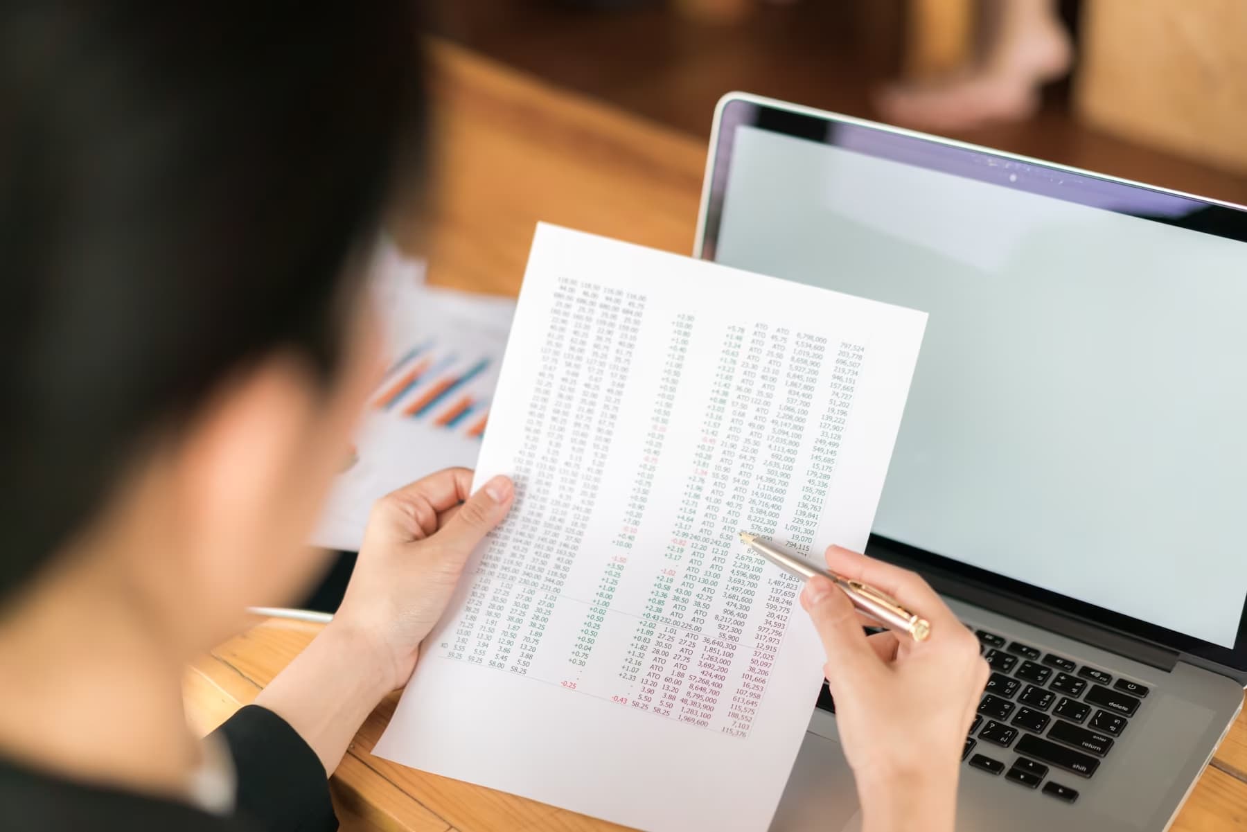 a woman checking a bank statement