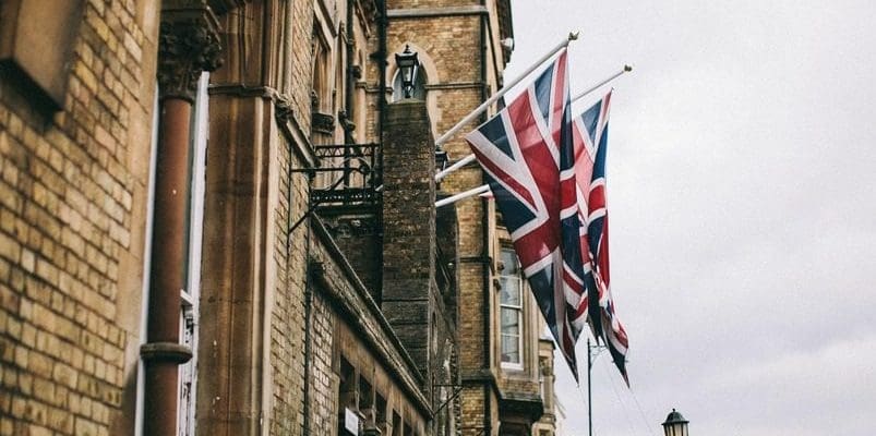 a building with a UK flag hanging on the wall