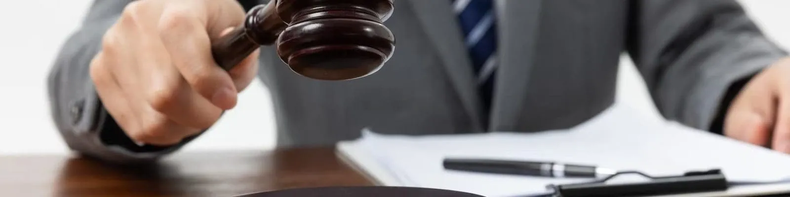 a person holding a gavel