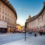 People walking on street in London.