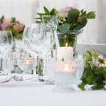 flowers on a table to signify a wedding reception