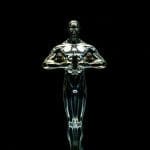 prize statuette against a black background