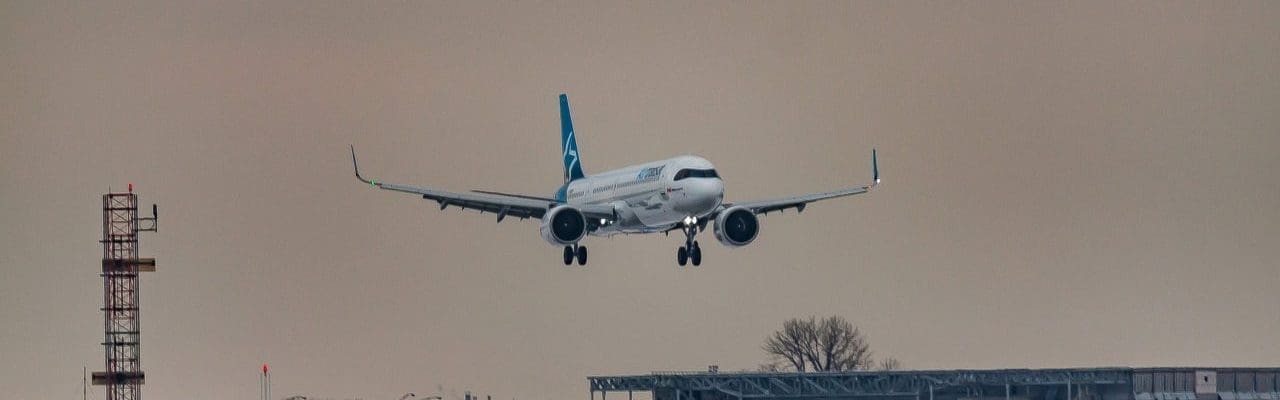 plane touching down at airport