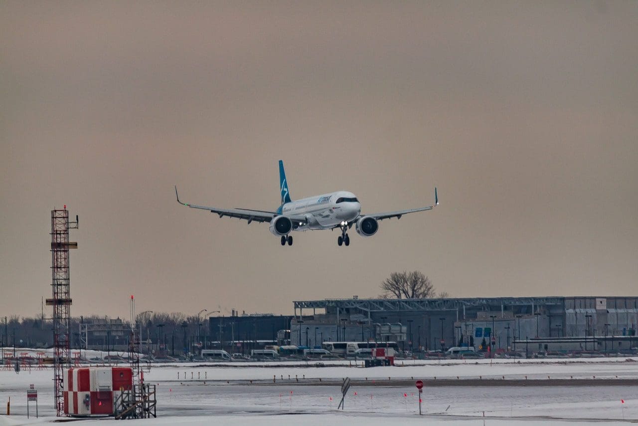 plane touching down at airport