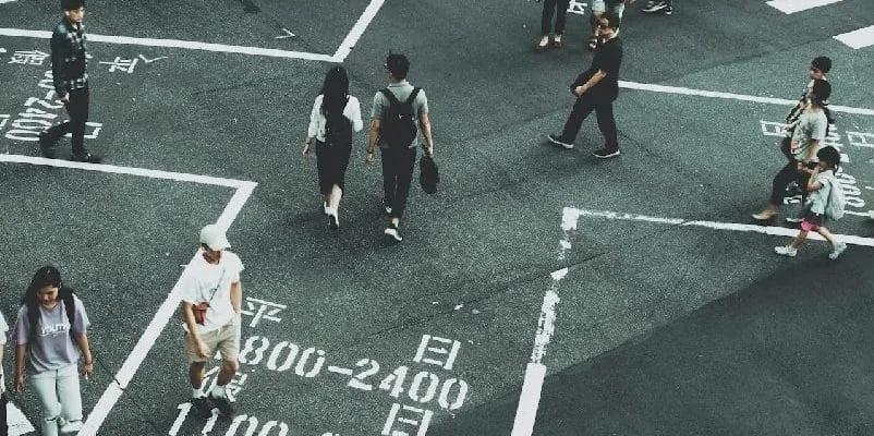 People walking across road in Taiwan