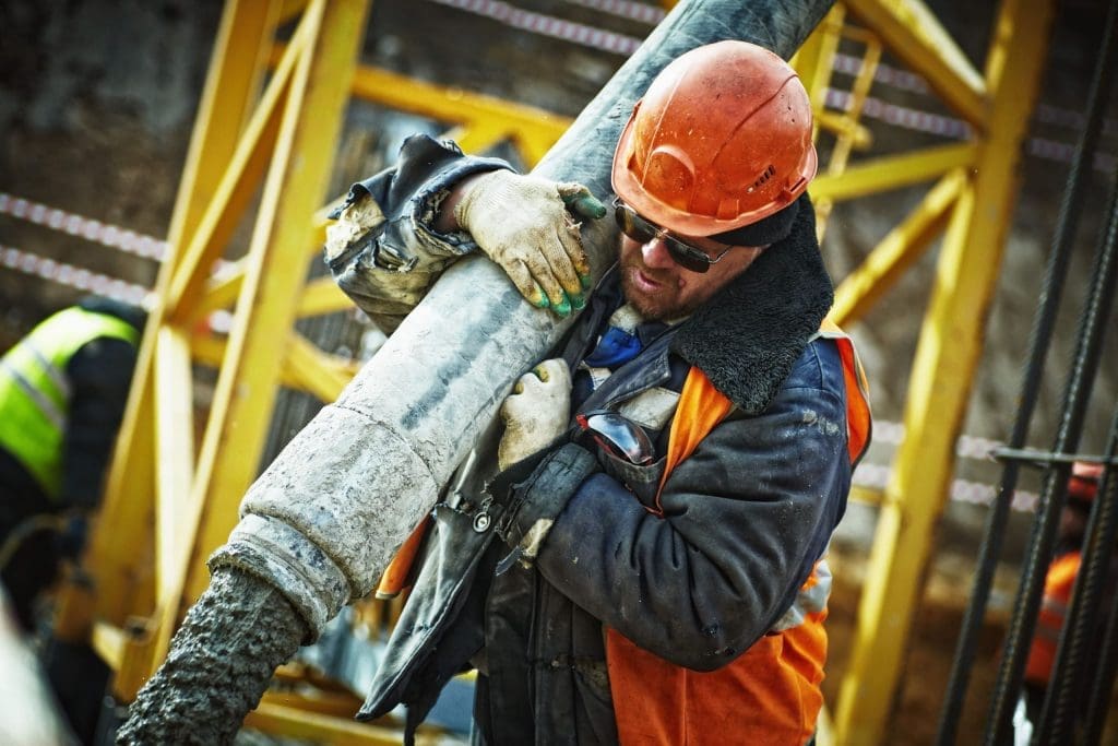 Worker in hard hat on construction site