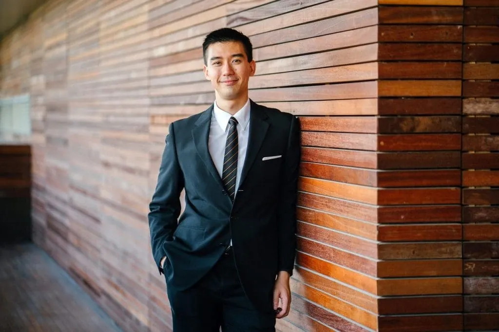A lawyer in smiling to the camera