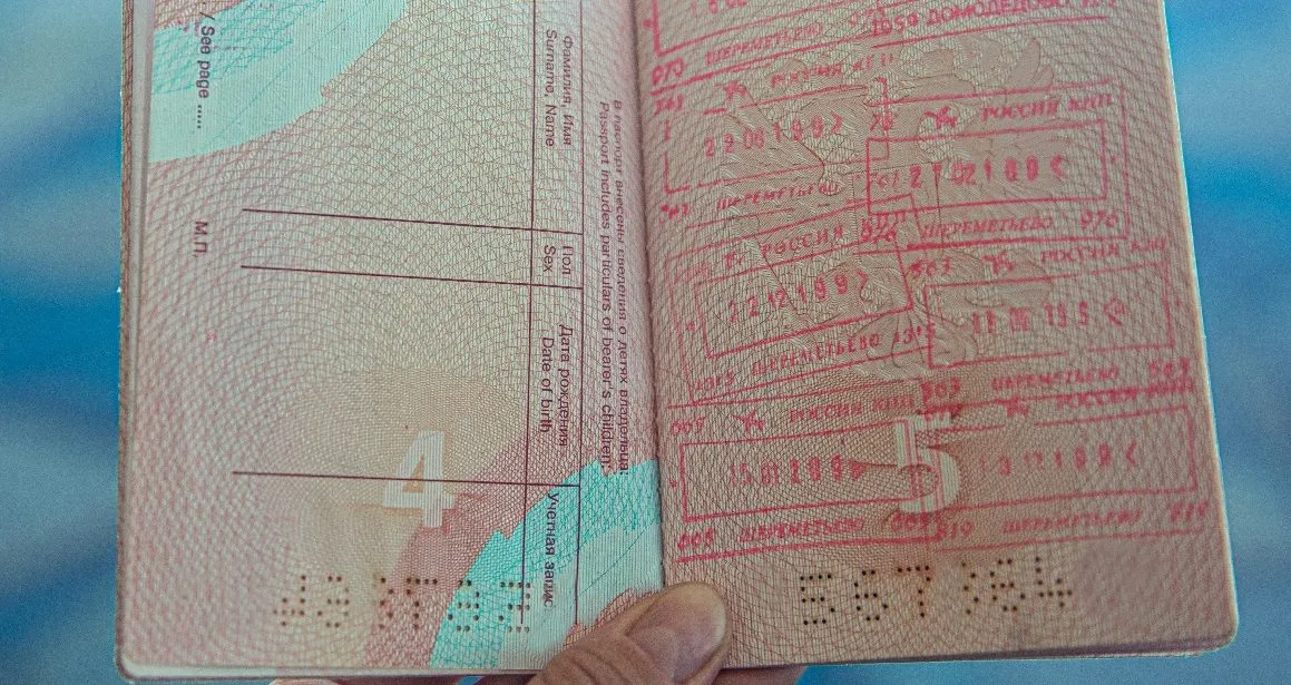 Opened passport with visas stamped