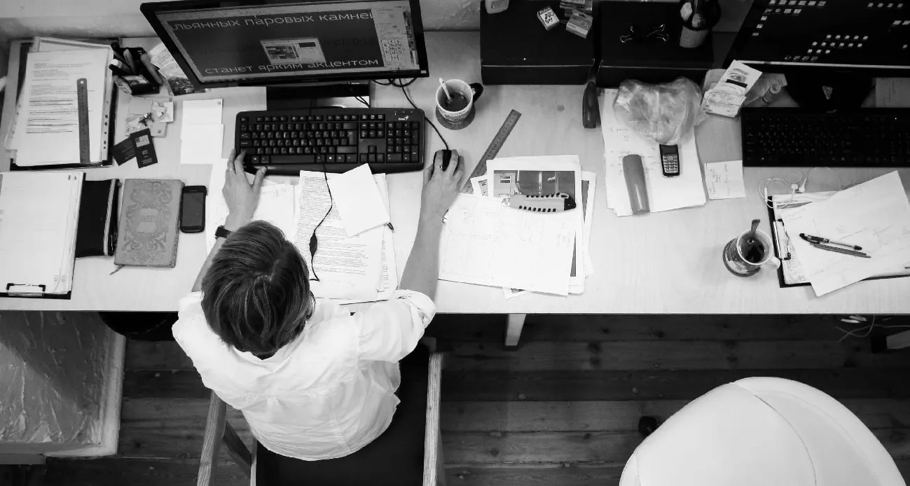 Adult at work desk