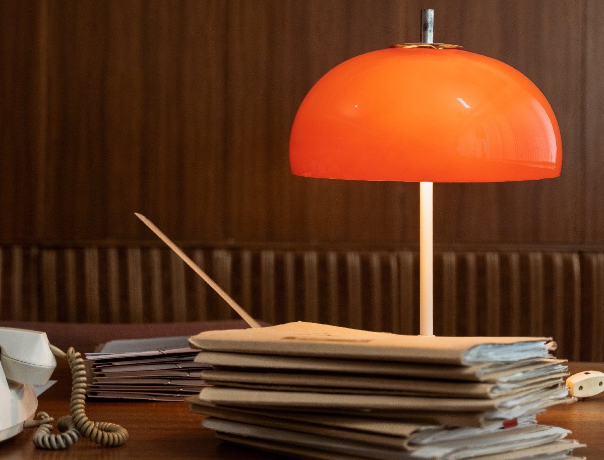 Lamp on desk of documents